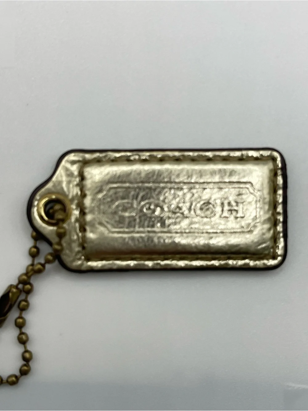 Coach Metallic Gold Leather Hang Tag